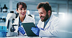 Tablet, research and happy people in lab, science and discussion for medical results. Scientist, man and woman in meeting, teamwork and biotech for pharmaceutical review and feedback for breakthrough