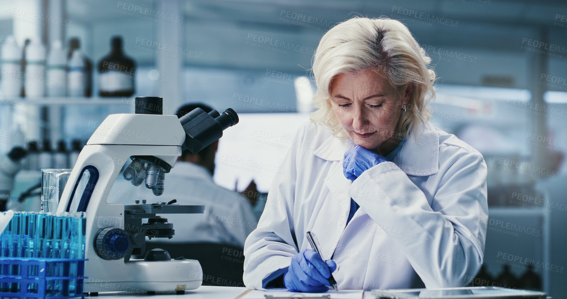 Buy stock photo Woman, writing and notes with clipboard at lab for science, medical research and insight for virus cure. Mature person, admin and checklist for progress report, feedback or pharma study for vaccine