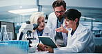 Science, tablet and talking with people in laboratory together for development or research. App, feedback and microscope with scientist team at work on clinical trial, medical industry or study