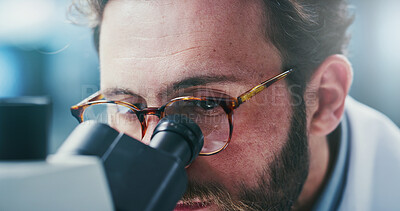 Buy stock photo Man, scientist or investigation with microscope in laboratory for medical research or exam. Male person, biotechnology or experiment with test or inspection for forensic study, clinic trial or review