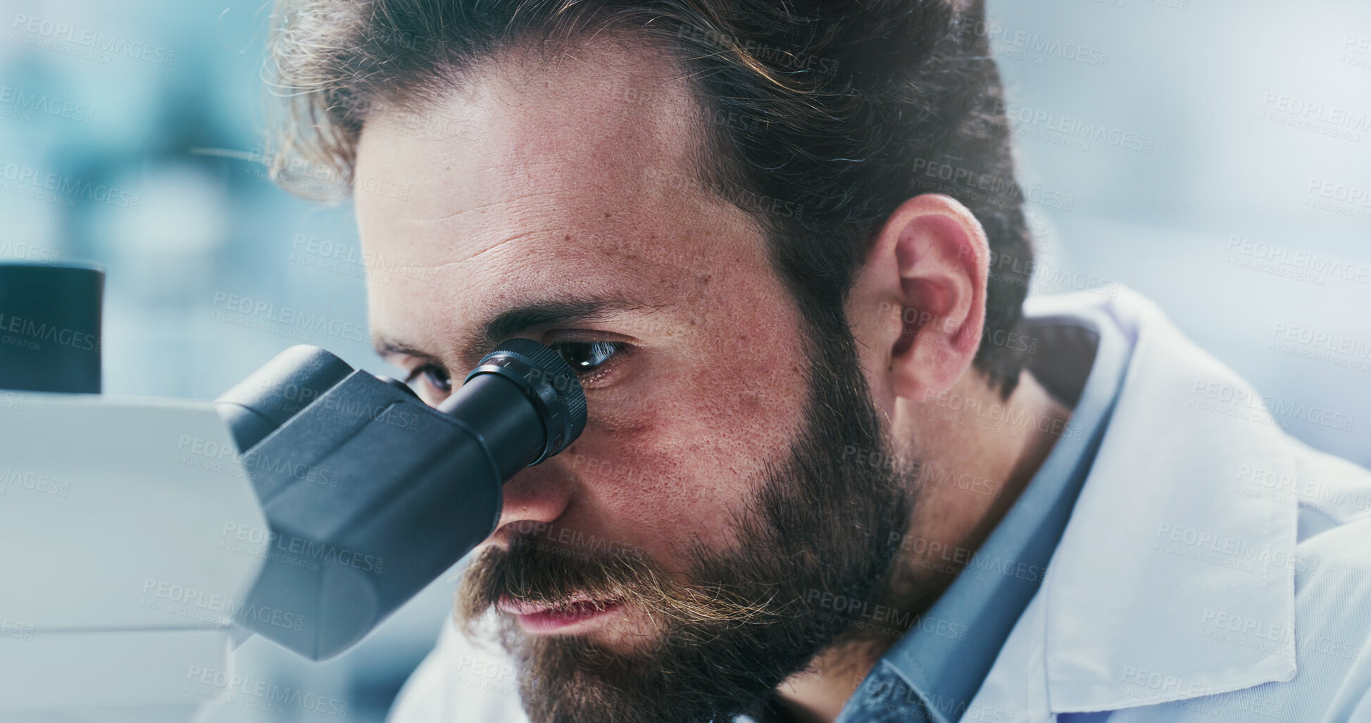 Buy stock photo Science, investigation or man in lab with microscope, test or examination in biochemistry. Clinical research, review or scientist with equipment, medical analysis or inspection in rna development.