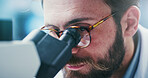 Science, glasses and man with microscope, lab and disease diagnosis for healthcare or medical study. Scientist, vision and person with equipment for cell analysis, exam and histopathology in clinic