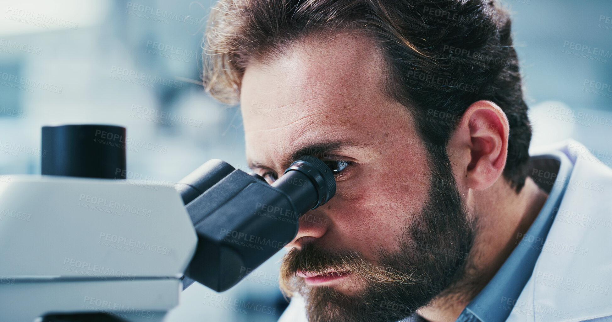 Buy stock photo Science, study or man in lab with microscope, investigation or examination in biochemistry. Clinical research, review or scientist with equipment, medical analysis or inspection in rna development.