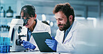 Microscope, science and tablet with happy people in laboratory together for development or research. App, feedback and smile with scientist team at work on clinical trial results or medical study