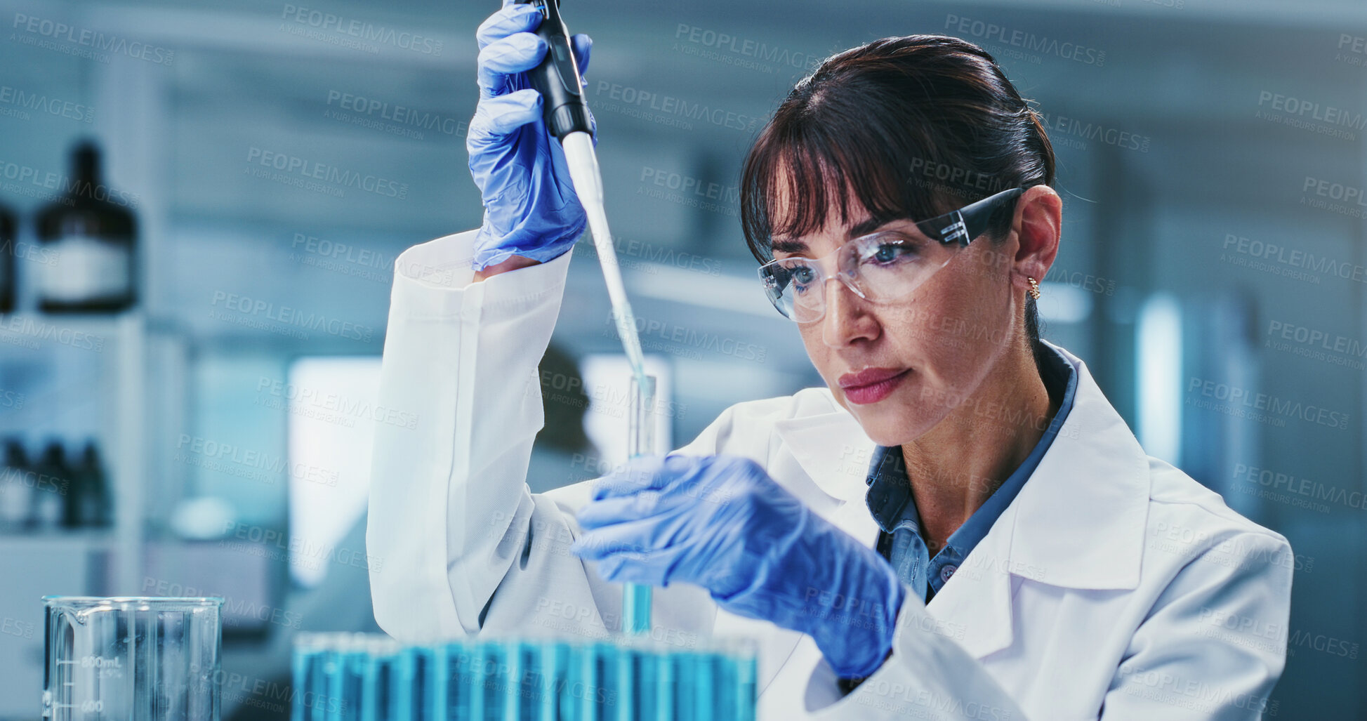 Buy stock photo Scientist, test tube and woman with pipette in lab, drug development for metabolic disease or biotech. Healthcare worker, glasses and mature person with medical research, innovation and diabetes cure