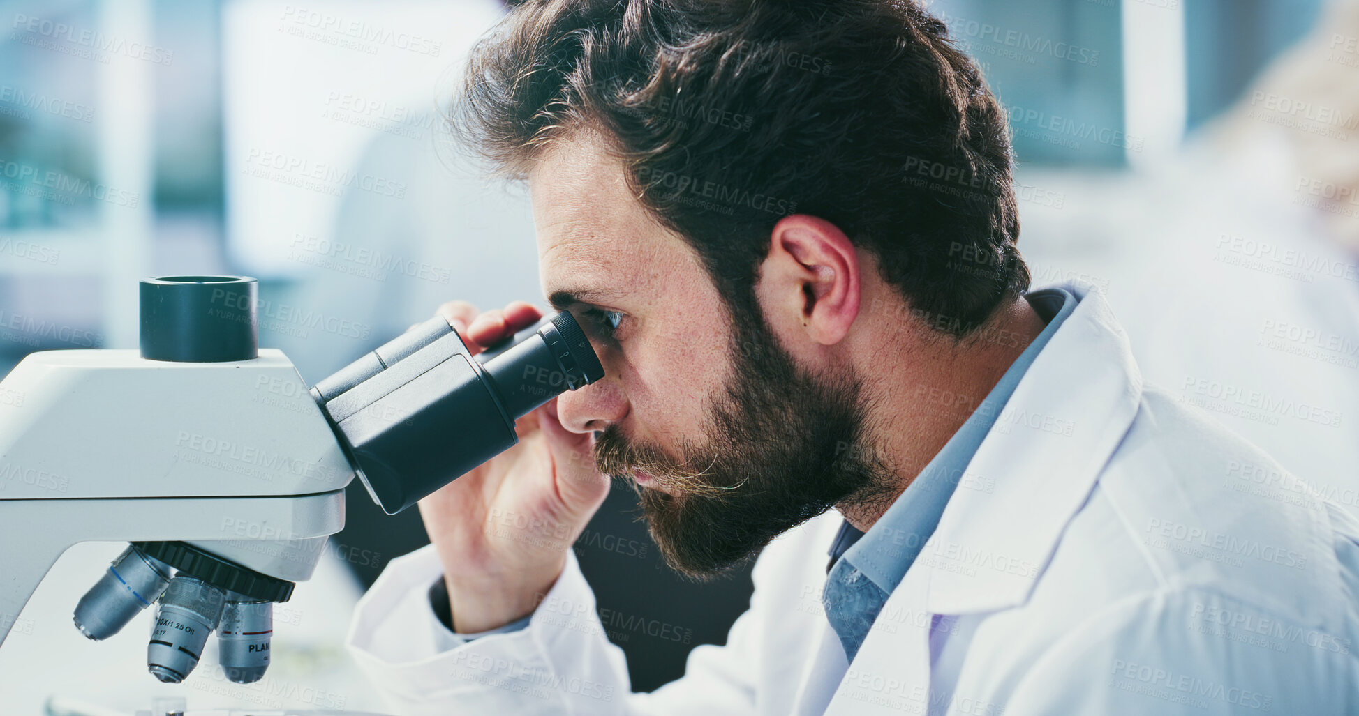 Buy stock photo Science, research or man in lab with microscope, investigation or examination in biochemistry. Clinical study, review or scientist with equipment, medical analysis or inspection in rna development.