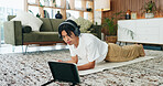 Fitness, headphones and tablet with Asian man in home living room for exercise or training routine. Health, plank and video streaming with person on floor in apartment for online course or tutorial