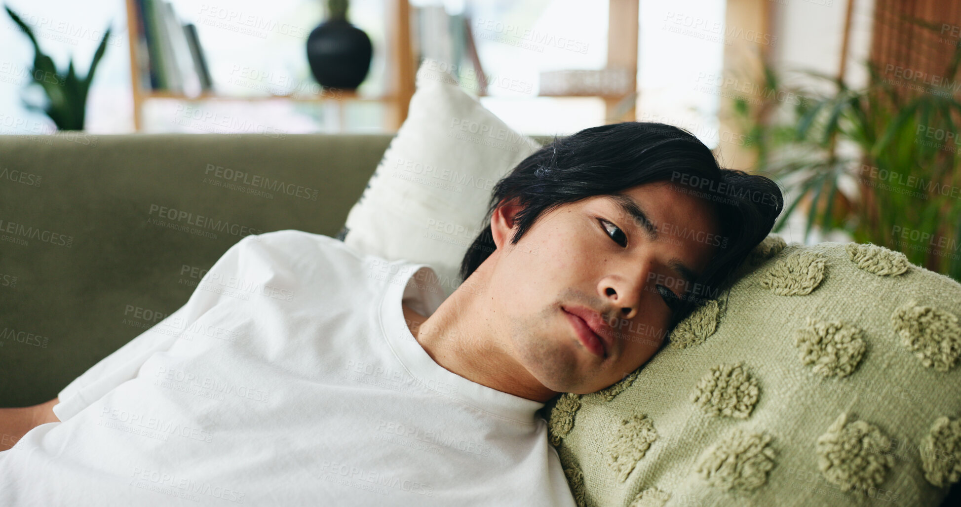 Buy stock photo Rest, thinking and tired with Asian man on sofa in home living room for break, morning or weekend. Comfortable, ideas and lazy with exhausted person in apartment lounge for afternoon nap or fatigue