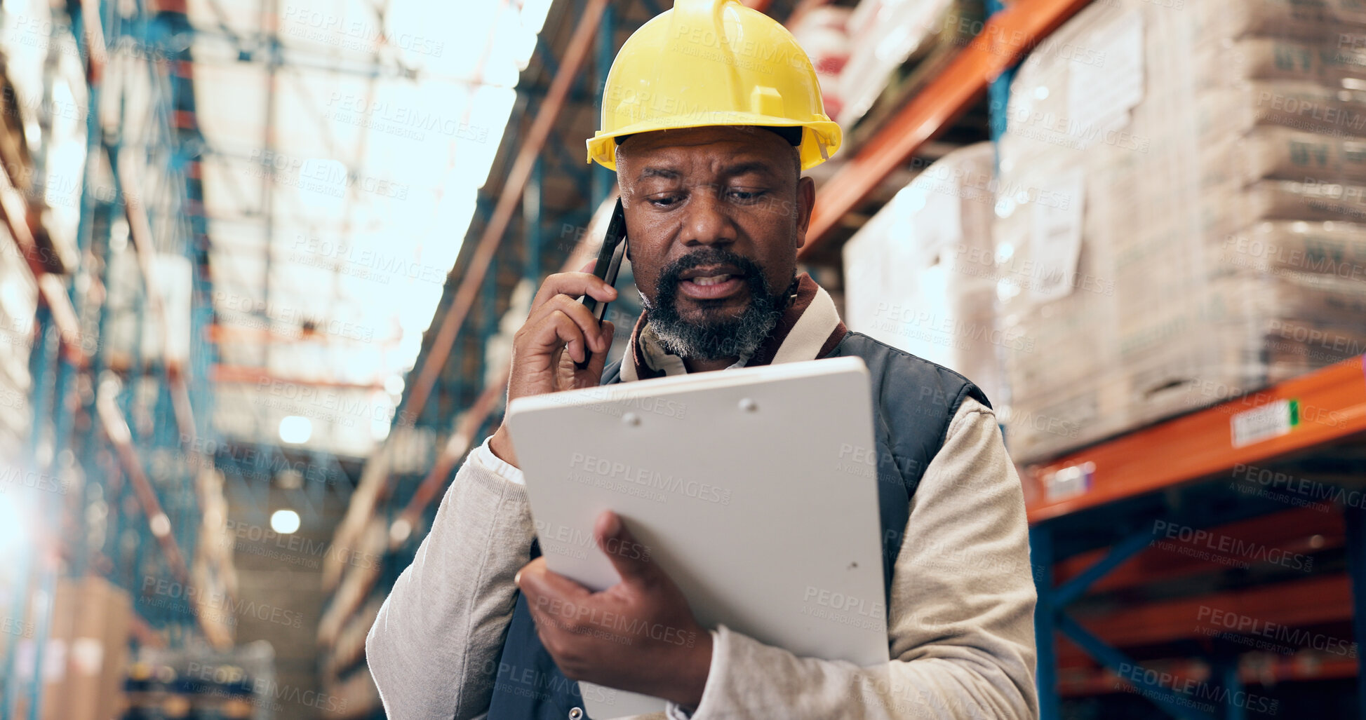 Buy stock photo Phone call, clipboard and black man in warehouse for inspection, inventory and stock checklist. Supervisor, factory and person on smartphone for communication for logistics, shipping or distribution