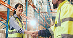 Happy, business people or meeting with handshake in warehouse for logistics or partnership together. Man, woman or colleagues shaking hands with smile for shipping success, deal or teamwork in depot