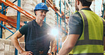 Meeting, teamwork and men in warehouse for logistics, shipping and planning for delivery schedule. Supervisor, factory and workers in discussion for distribution, inventory check and inspection