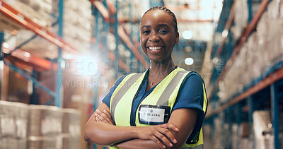 Buy stock photo Black woman, portrait and logistics with confidence in warehouse for storage or shipping service. Happy, female person or distributor with flare or arms crossed for supply chain or freight in depot