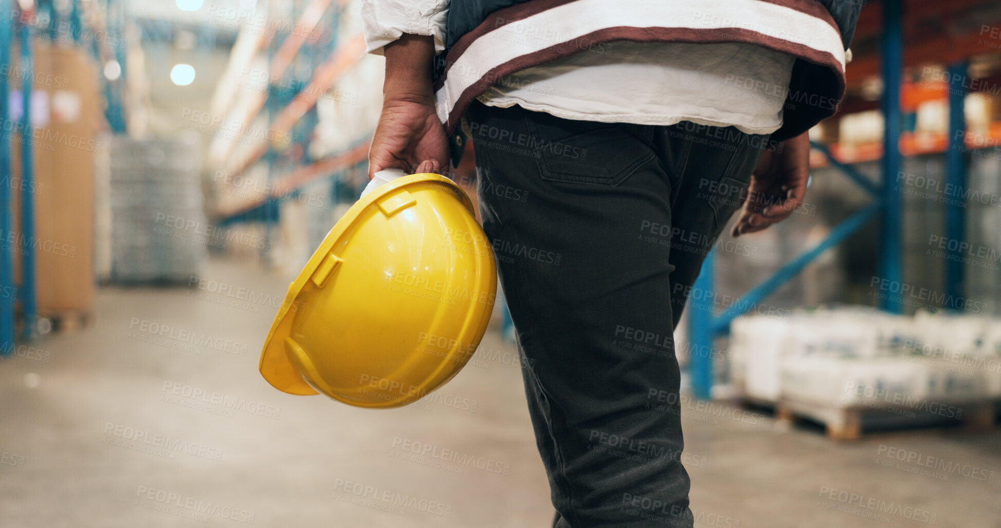 Buy stock photo Walking, helmet and back of man in warehouse for supply chain, inventory and stock inspection. Supervisor, factory and legs of person with safety gear for logistics, ecommerce and distribution