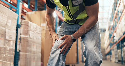 Buy stock photo Logistics, hands and employee with knee pain in factory, distribution and loader with muscle tension. Shipping, stock and person with leg injury, inflammation and work accident in warehouse or strain