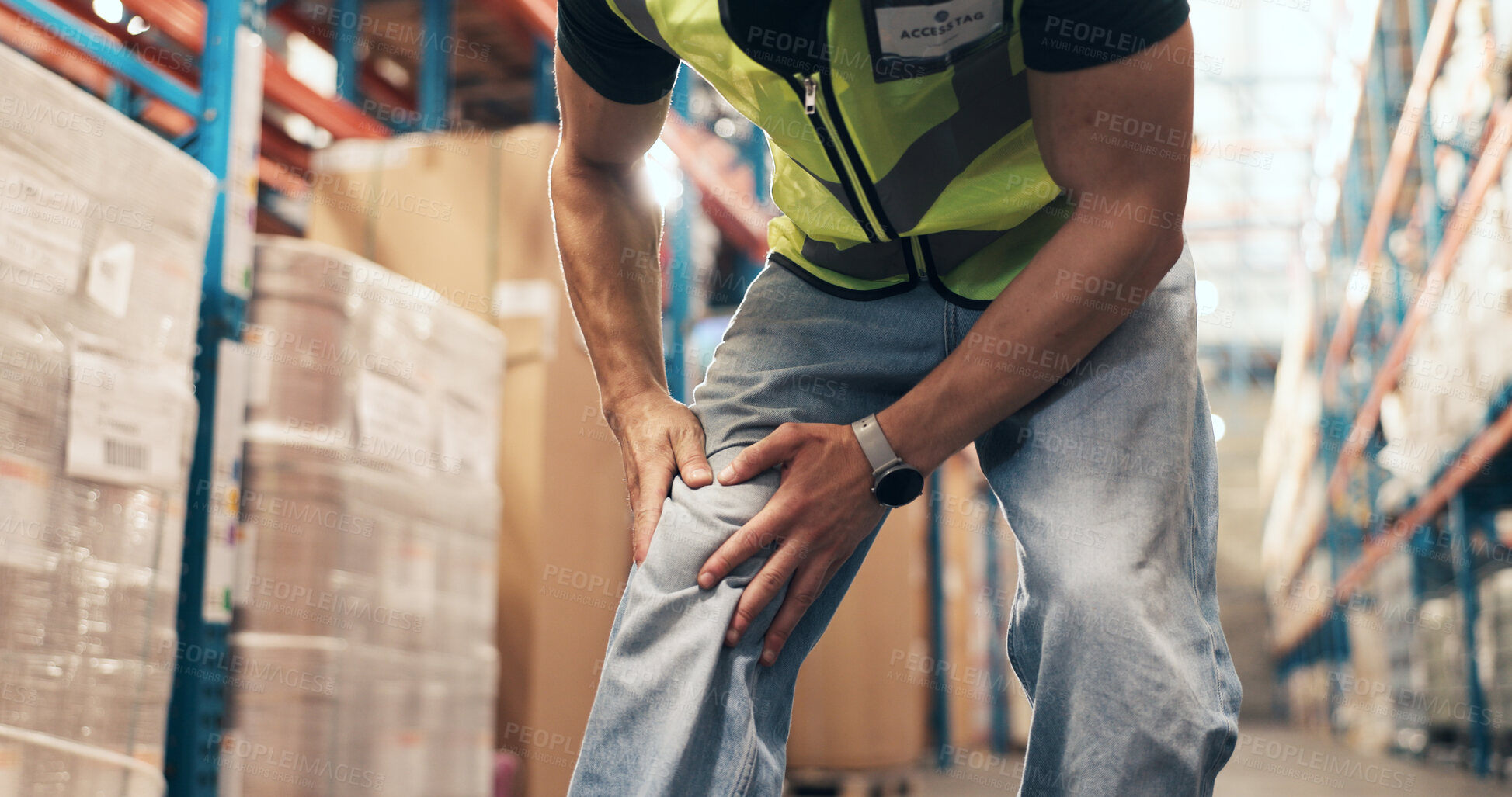 Buy stock photo Logistics, hands and employee with knee pain in factory, distribution and loader with muscle tension. Shipping, stock and person with leg injury, inflammation and work accident in warehouse or strain