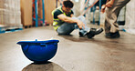 Logistics, helmet and employee with injury in warehouse, hurt and stock distribution or supply chain. Shipping, loader and person with muscle tension, workplace accident and safety risk in factory