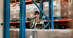 Warehouse, radio and woman with tablet for shipping, inventory update or conversation. Mature person, logistics and talking with technology for communication, storage and stock for supply chain