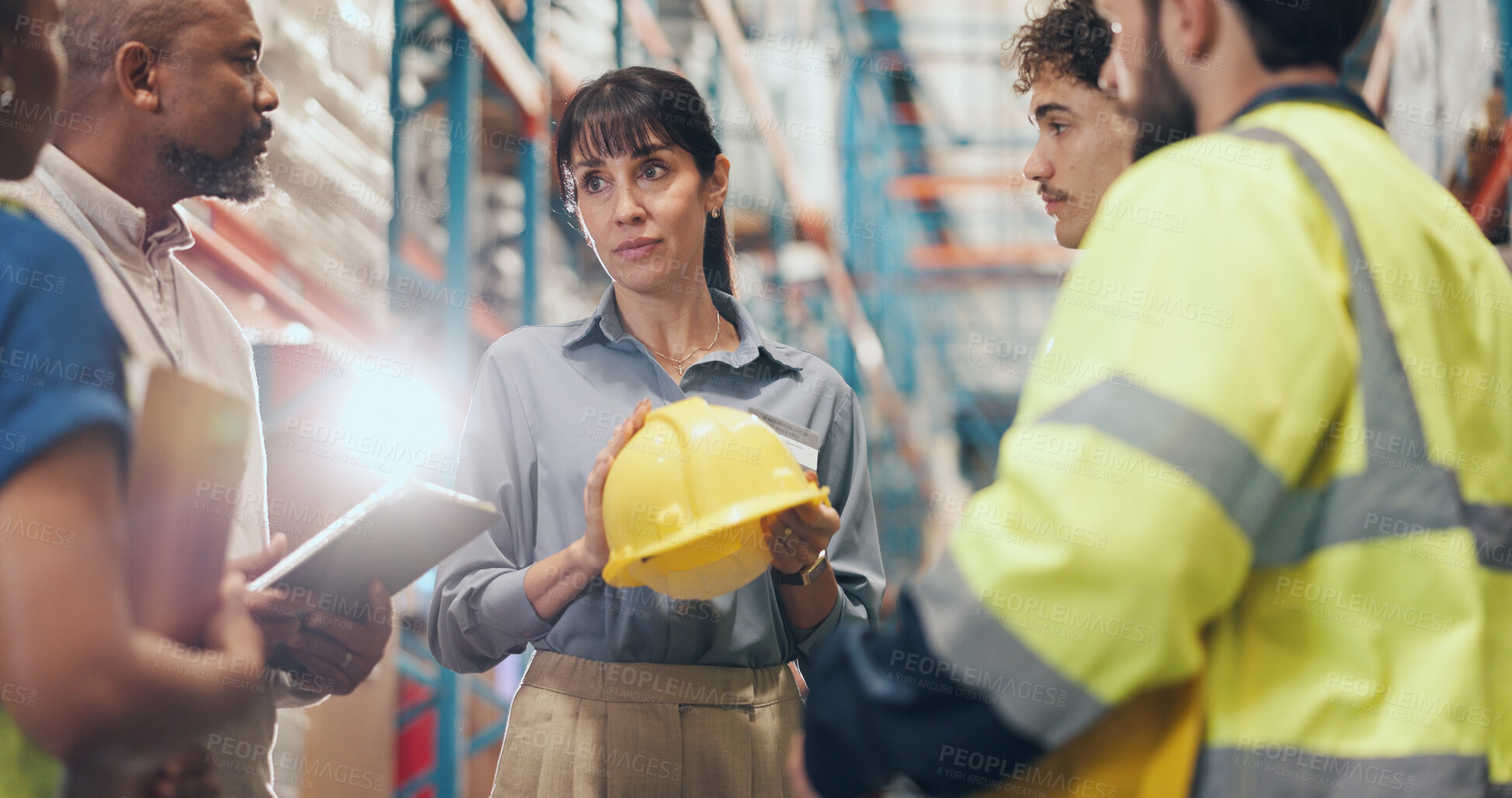 Buy stock photo Logistics, team and safety meeting with helmet for PPE compliance, injury prevention and flare. People, warehouse supervisor and discussion with hardhat for OSHA regulations, hazard reporting or risk