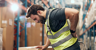 Buy stock photo Shipping, loader and man with backache in warehouse, injury and stock distribution and supply chain. Logistics, flare and person with joint pain in factory, workplace accident or hurt with sprain