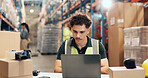 Logistics, man and reading laptop in warehouse for order tracking, shipping status or distribution. Supply chain staff, person and tech for stock control, delivery schedule and inventory management