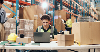 Buy stock photo Logistics, man and typing on laptop in warehouse for order tracking, shipping status or distribution. Supply chain staff, person and tech for stock control, delivery schedule and inventory management