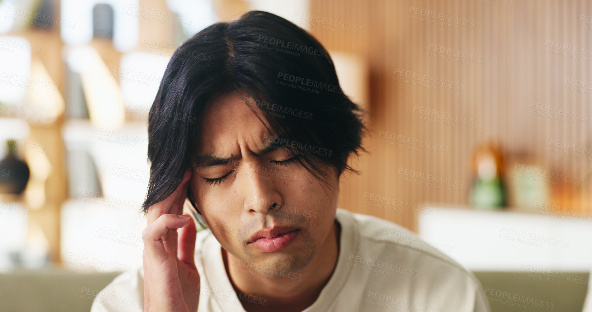 Buy stock photo Sick, man and headache in house with fatigue, unemployment crisis and symptoms of medical problem. Tired, person and migraine in living room with health issue, pain and burnout from jobless stress.