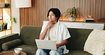 Man, thinking and remote work on sofa with laptop, digital marketing idea or inspiration for project. Freelancer, person and reflection in home with computer, creativity and decision for advertising.