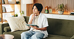 Man, thinking and remote work on sofa with tablet, digital marketing idea or inspiration for project. Freelancer, person and reflection in home with tech, creativity or vision for online advertising.