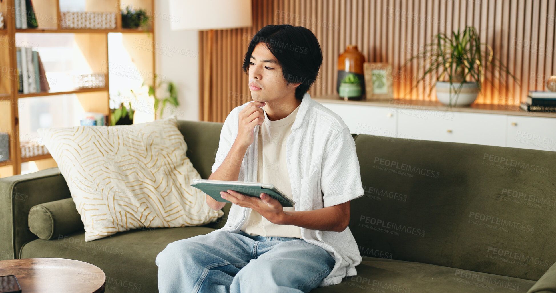 Buy stock photo Man, thinking and remote work on sofa with tablet, digital marketing idea or inspiration for project. Freelancer, person and reflection in home with tech, creativity or vision for online advertising.