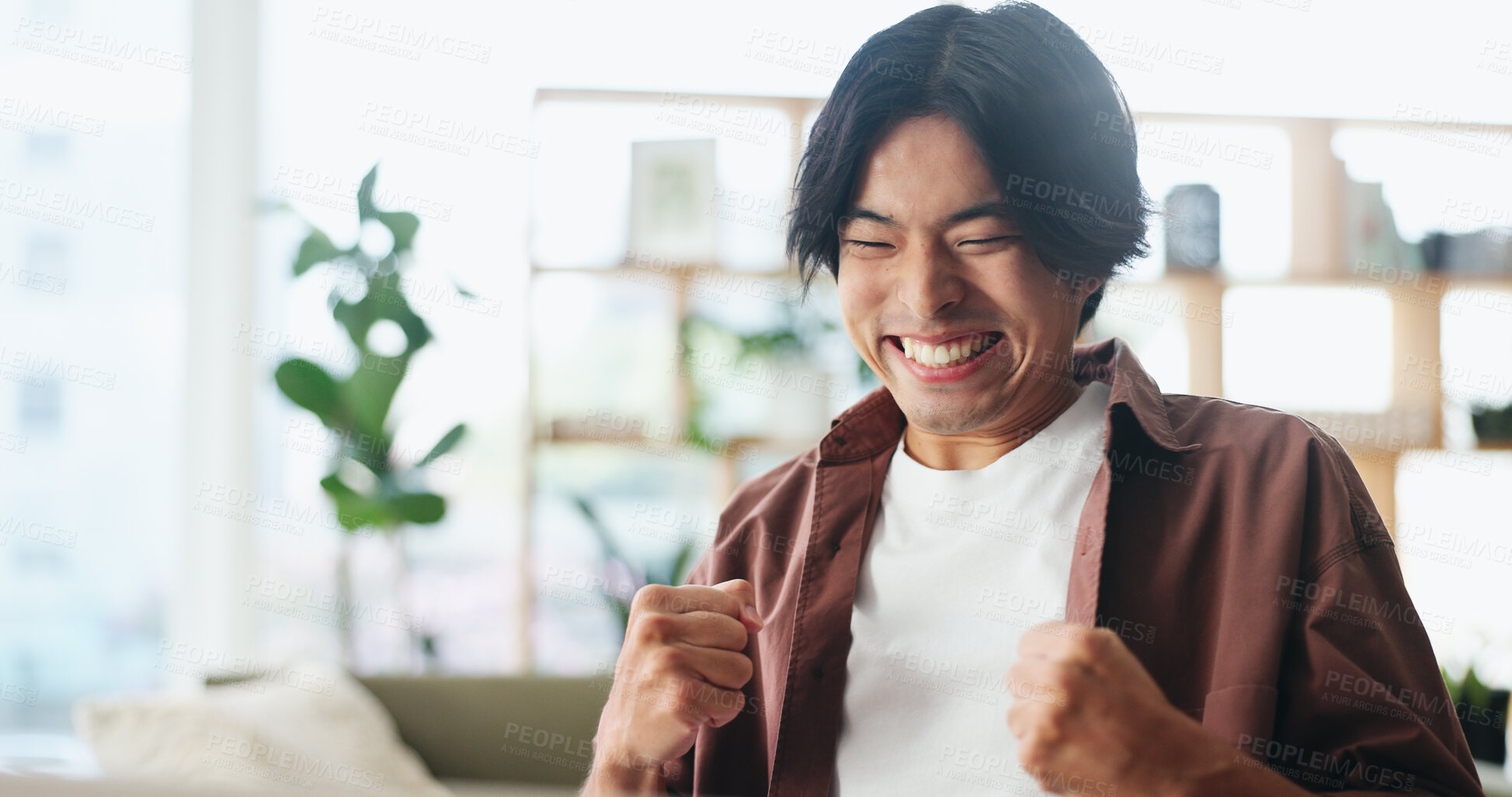 Buy stock photo Excited, man and winning with fist pump in home for good news, project success or achievement. Happy, male person or winner with smile or accomplishment for promotion, bonus or victory in house
