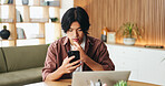 Laptop, reading and asian man with phone for remote work, email notification and client project guidelines. Planning, tech and person with review instructions for task criteria, freelancer and home