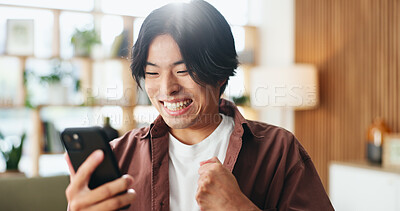 Buy stock photo Phone, fist pump and man in home with gambling, winning or online casino on mobile app. Digital tech, excited and male person with celebration with notification, good news and success in living room