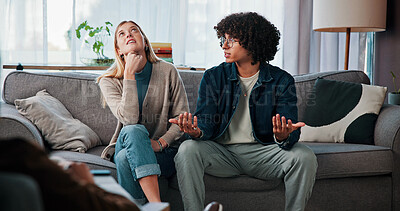 Buy stock photo Psychology, couple and fight in therapy on sofa for infidelity, toxic relationship and trust issue. Divorce, talking and interracial people with conflict in counseling for betrayal, affair and crisis