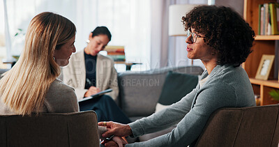 Buy stock photo Therapy, holding hands and support with couple in office for healing, love and help. Relationship counseling, psychology solution and marriage partner with man and woman in clinic for advice