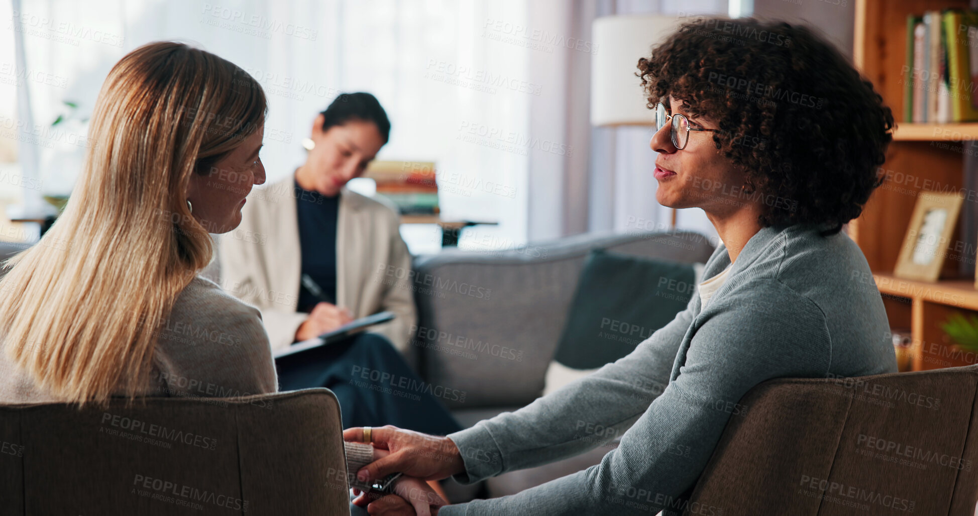 Buy stock photo Therapy, holding hands and support with couple in office for healing, love and help. Relationship counseling, psychology solution and marriage partner with man and woman in clinic for advice