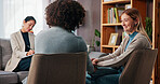 Therapist, couple and holding hands in counseling for support, love or advice for resolution. Man, woman or consultation with psychologist for marriage, solution or smile in office for relationship