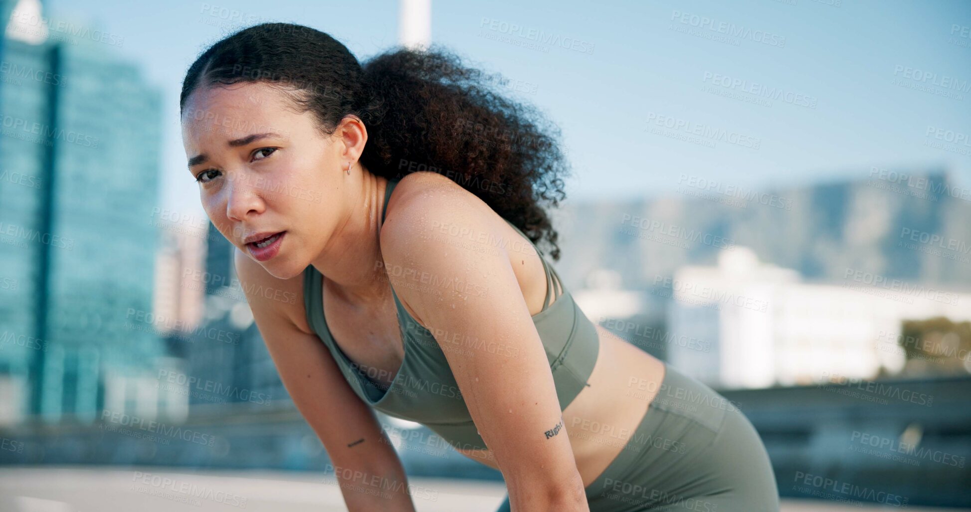 Buy stock photo Runner, tired and portrait of woman in city on break for exercise, workout and training. Sports, fatigue and person in town for rest, breathe and fitness for active hobby, wellness and health