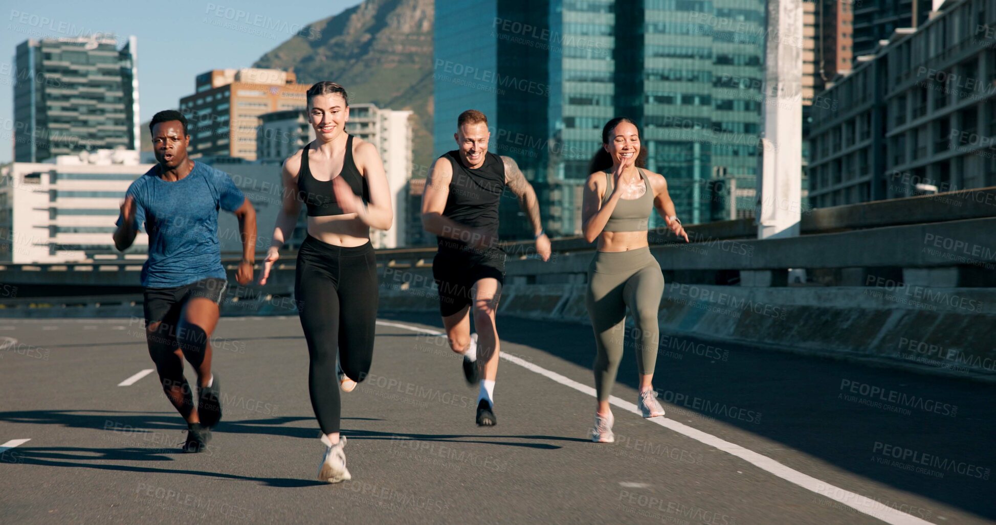 Buy stock photo Happy people, fitness or running with friends in road for cardio workout or outdoor exercise. Active, group or runners with smile on city street for physical activity, race or training in urban town