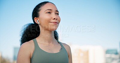 Buy stock photo Runner, thinking and woman with earphones in city on break for exercise, workout and training. Sports, space and person in town for rest, music and fitness for active hobby, wellness and health