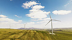 Farm, wind turbine and sustainability outdoor in nature, clean energy or eco friendly in environment. Aerial view, windmill and natural power plant with zero emissions, space or renewable electricity