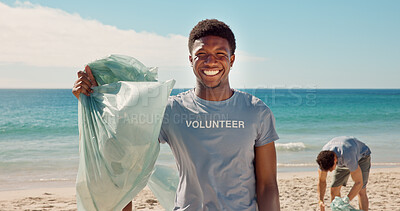 Buy stock photo Portrait, beach and man with trash bag, volunteer for social responsibility and waste management. Ocean, cleaning environment and happy person with plastic collection, sustainability and eco friendly