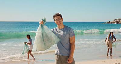 Buy stock photo Portrait, ocean and man with trash bag, volunteer for social responsibility and sustainability. Beach, cleaning environment and person with plastic collection, waste management and community service