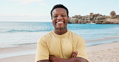 Buy stock photo Travel, portrait and man with arms crossed at beach, confident and happy on summer holiday or space. Ocean, vacation and black person with smile on weekend break, tourism and adventure in Nigeria