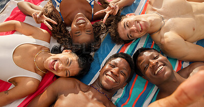 Buy stock photo Portrait, selfie and happy people at beach with peace sign, diversity and bonding for summer holiday. Above, friends and photography outdoor on towel with smile, v gesture and relax on vacation trip.