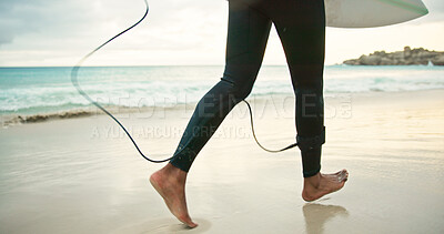 Buy stock photo Legs, running and surfer person on beach for holiday activity, sports hobby or weekend getaway. Feet, surfboard and vacation with athlete outdoor on sand at coast for fitness or training in summer