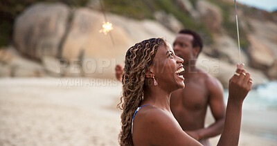 Buy stock photo Sparklers, beach and black woman on vacation with friends, funny joke or celebrate new year. Fireworks, ocean and excited people on holiday, party or laugh in summer at social gathering with space