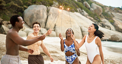 Buy stock photo Sparklers, beach and laugh with friends on vacation, travel together or celebrate new year. Fireworks, ocean or excited people on holiday, party or funny joke in summer at social gathering with group