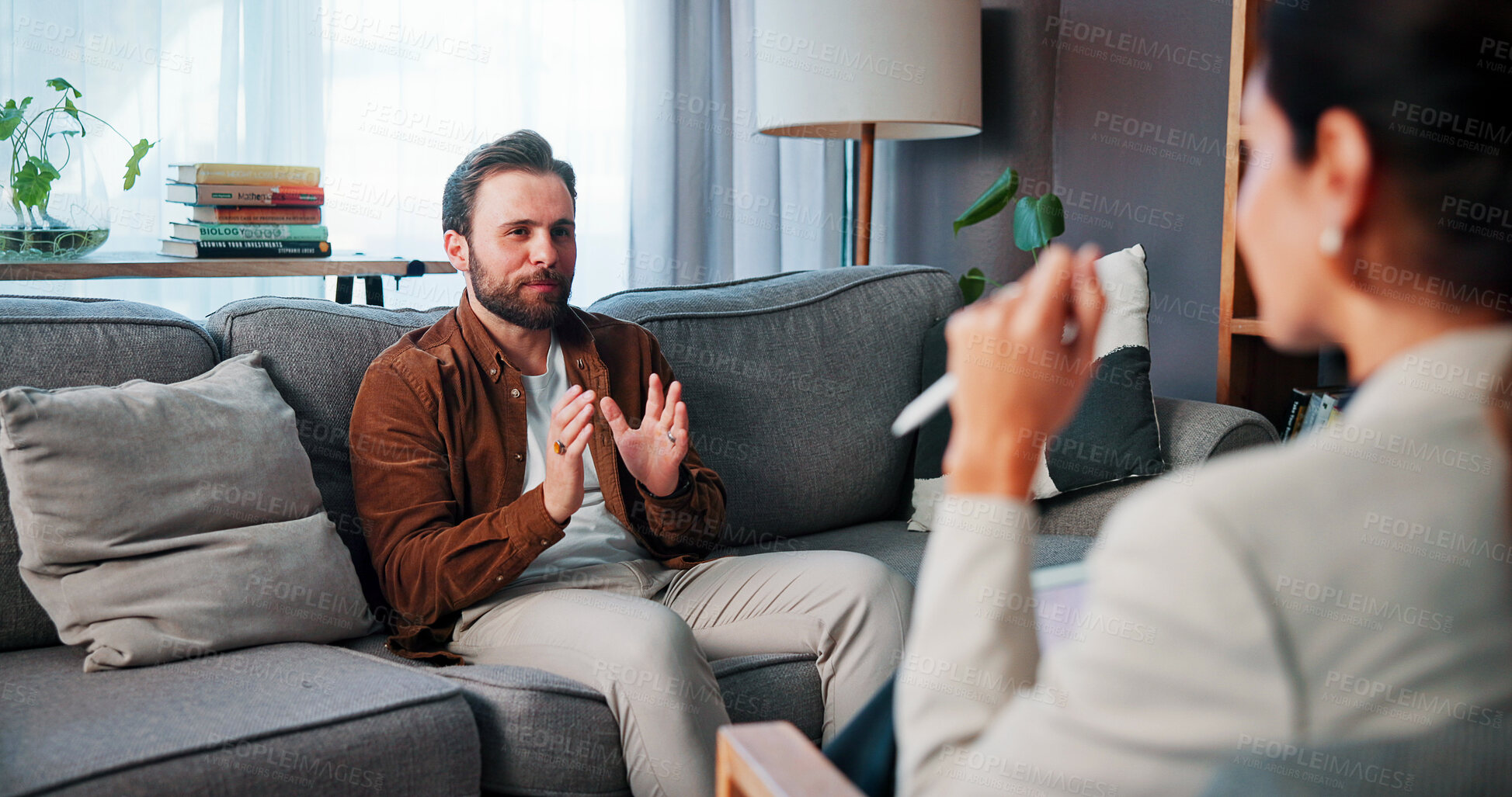 Buy stock photo Consulting, talking and therapy with people in clinic together for mental healthcare, help or support. Empathy, psychology and therapist speaking to patient in office for healing or rehabilitation