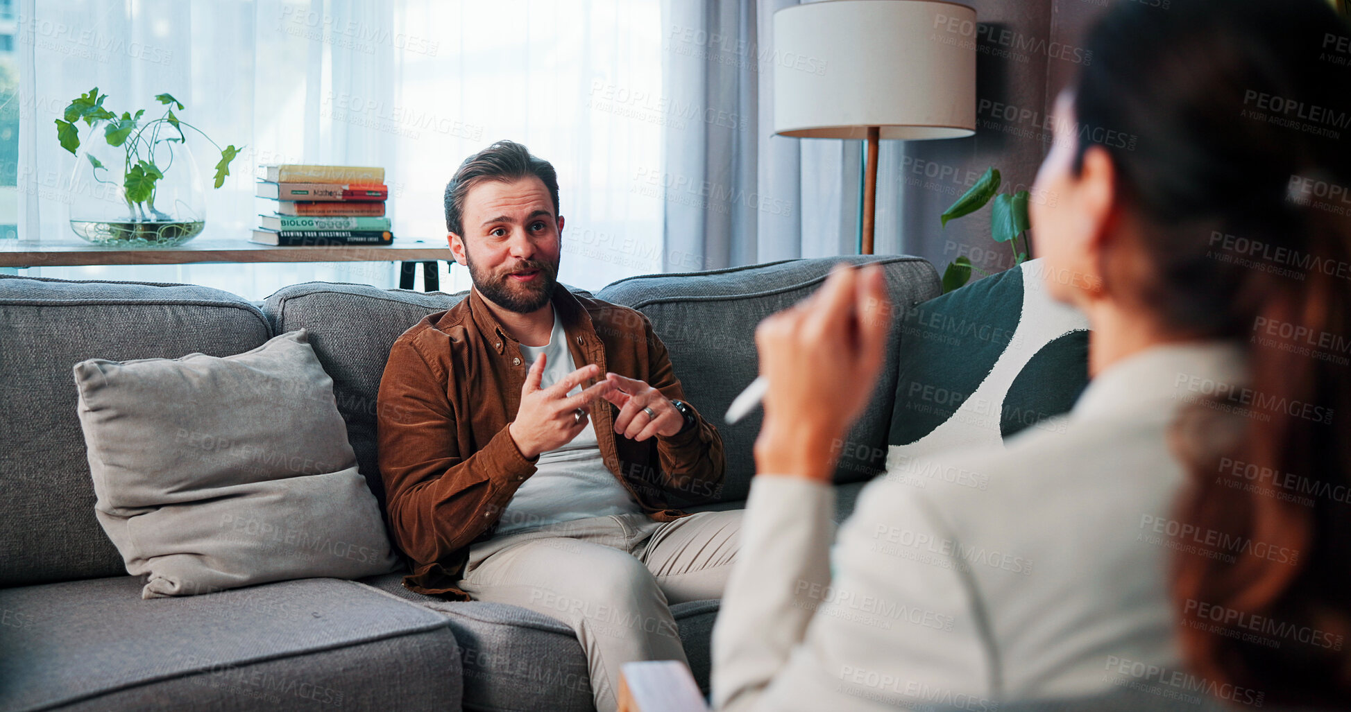 Buy stock photo Psychology, talking and therapy with people in clinic together for mental healthcare, help or support. Consulting, empathy and therapist speaking to patient in office for healing or rehabilitation