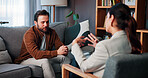 Mental health, counseling or people in office with checkup, evaluation or therapy in clinic visit. Guidance, patient or psychologist with consultation, emotional support or advice in trauma session.